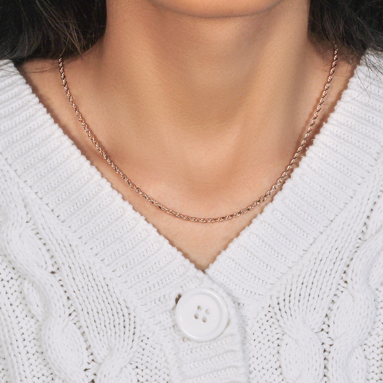 14k rose gold diamond cut rope chain, modern design, 2.30 mm width, showcasing luxurious craftsmanship and elegance.