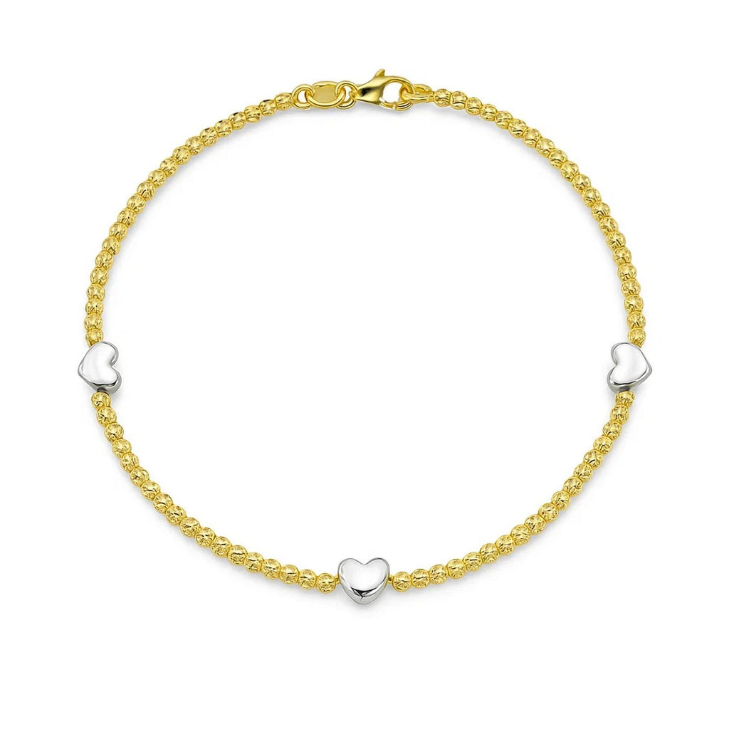 14k yellow and white gold heart bead bracelet adorned with sparkling diamonds, exuding elegance and luxury.
