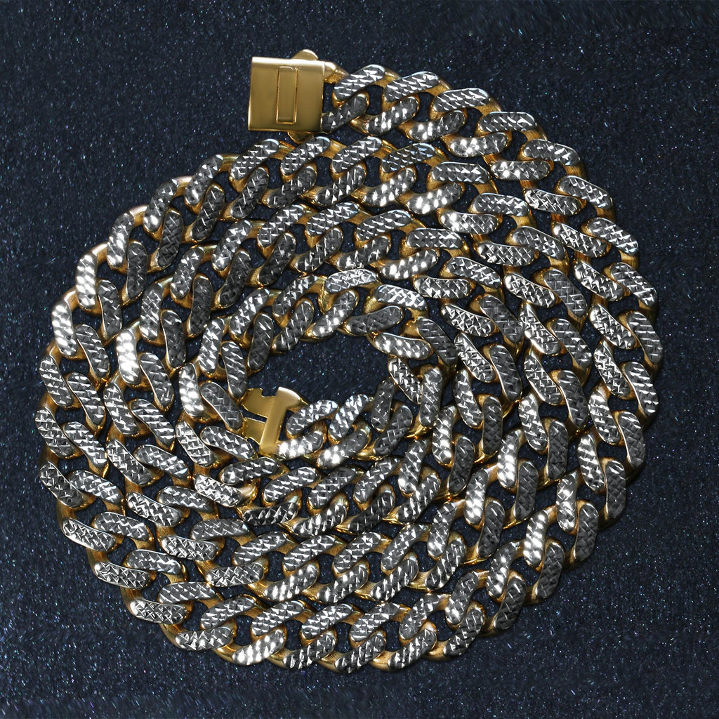 14k two-tone gold Miami Cuban chain necklace featuring white pave accents in a modern design.
