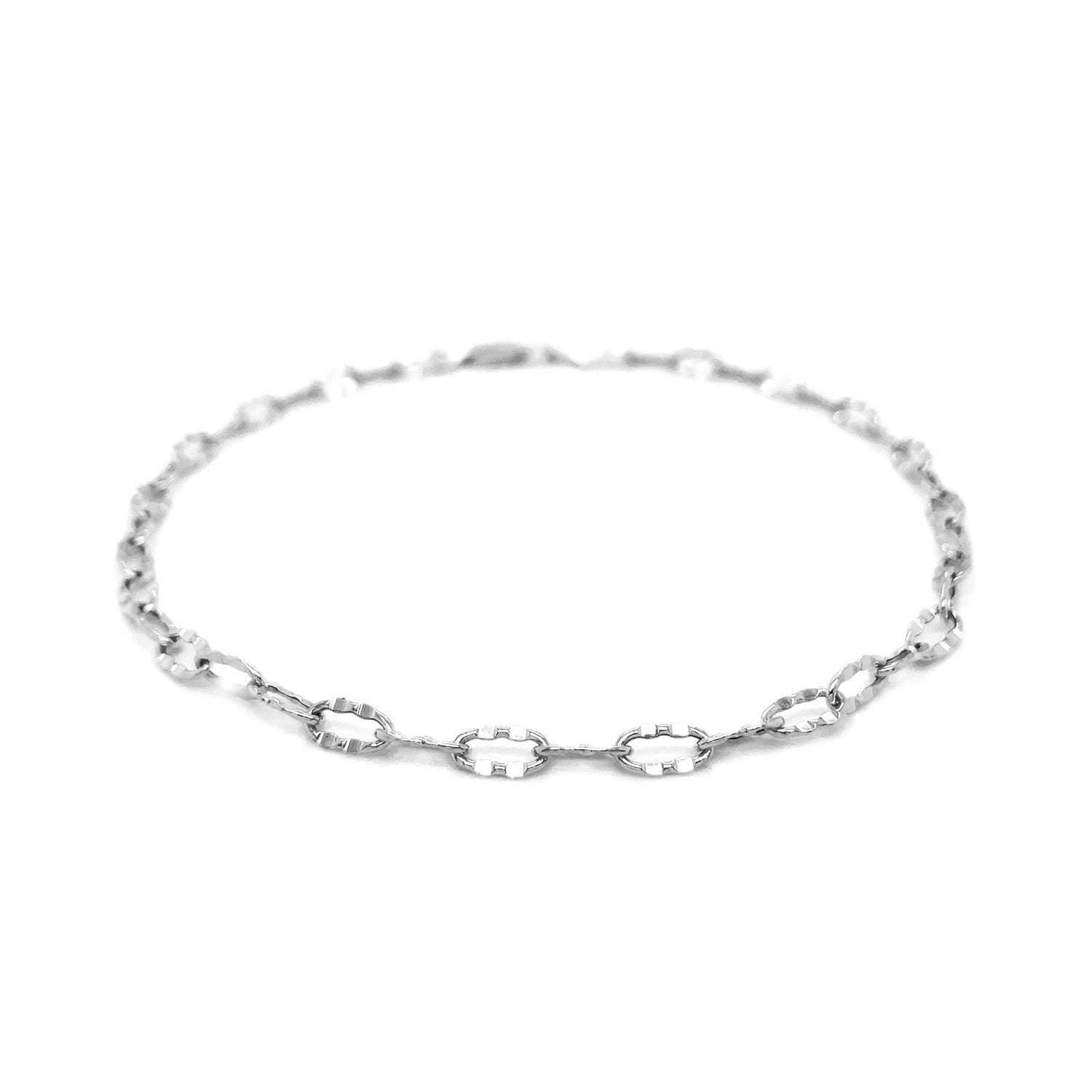 Elegant 14k white gold anklet featuring fancy hammered oval links for a refined, luxurious touch.