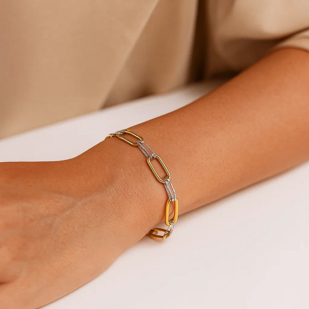 14K two-tone gold diamante paperclip bracelet featuring modern link design and exquisite diamond accents.