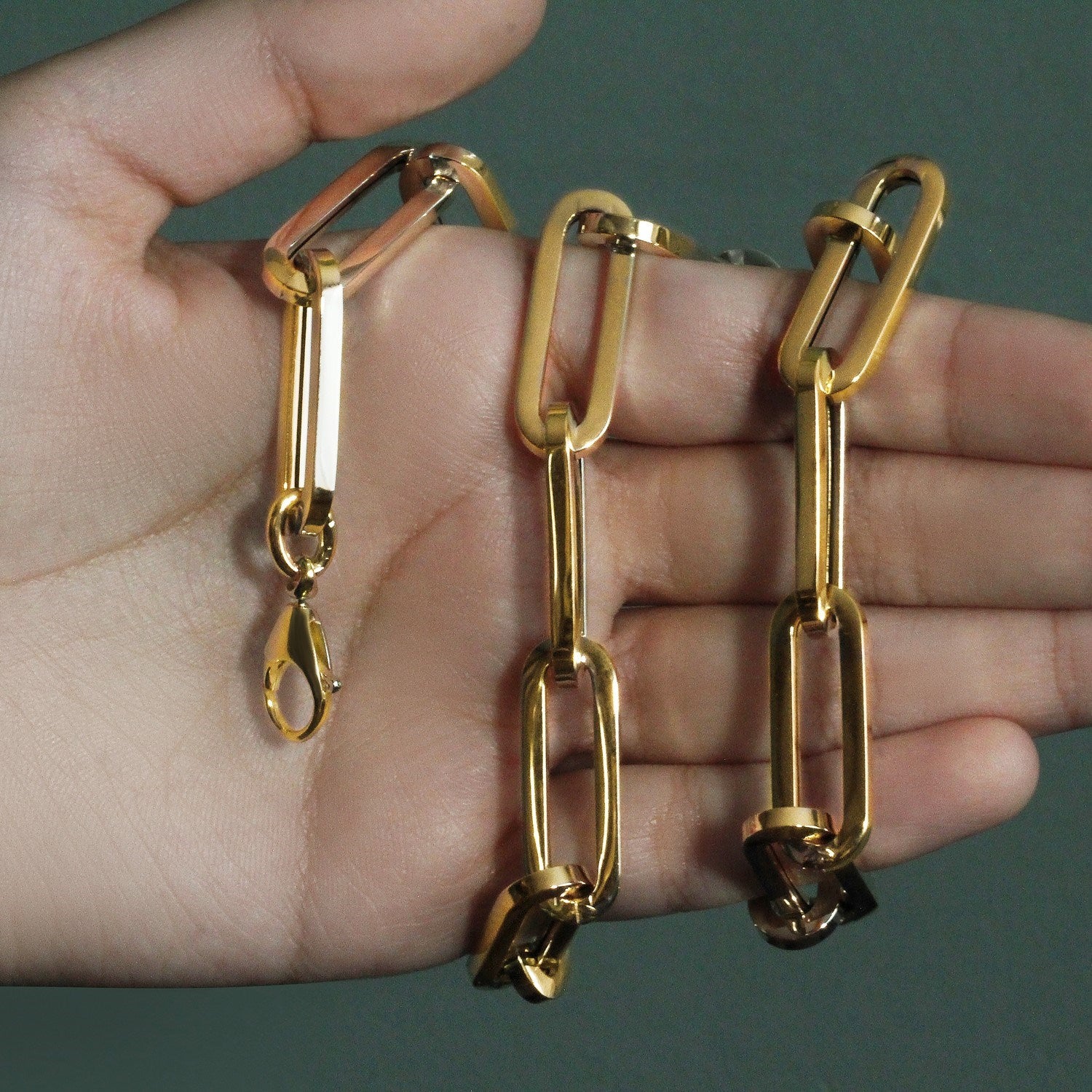 14k yellow gold extra wide paperclip chain necklace with modern design, showcasing elegance and luxury craftsmanship.