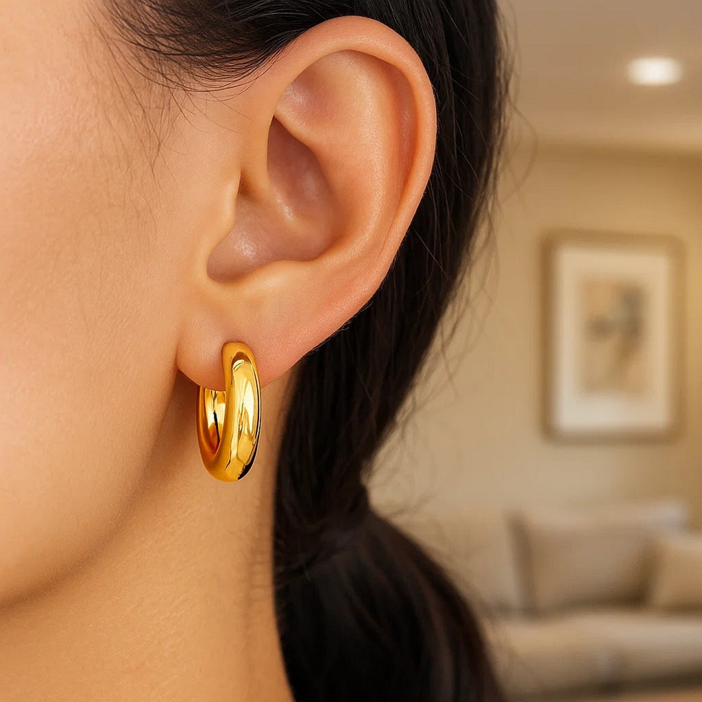 14k yellow gold large round electroform hoop earrings with a contemporary design, perfect for elegant occasions.