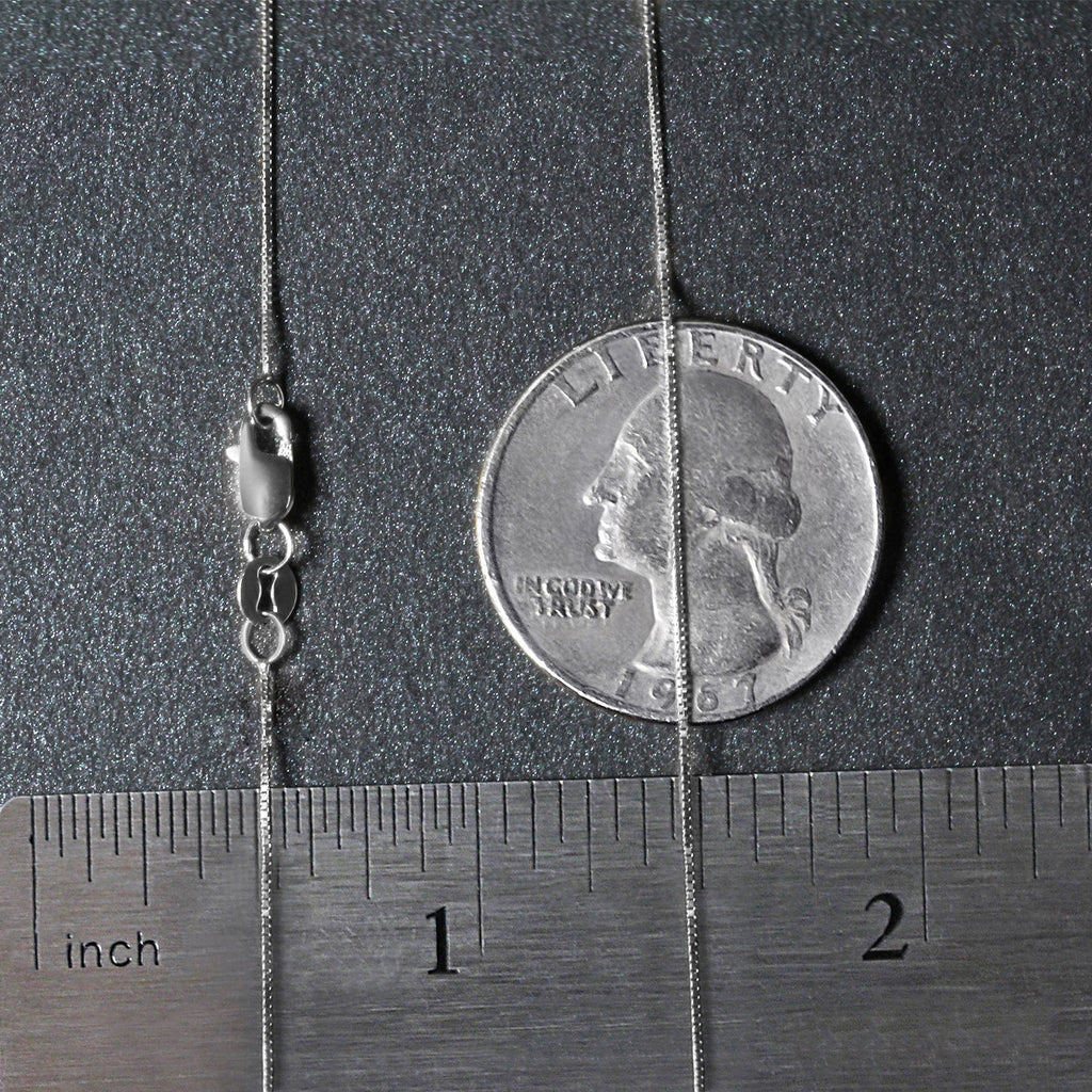 14k white gold classic box chain, 0.45 mm, featuring a sleek design perfect for layering or wearing solo.