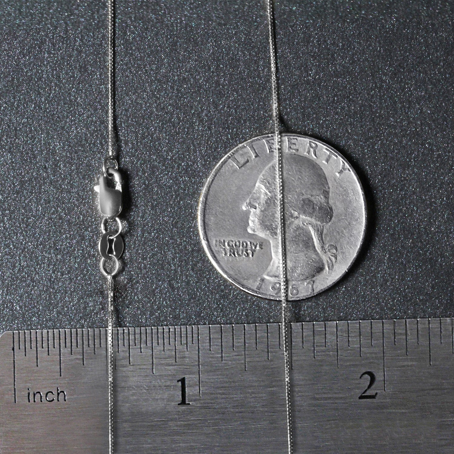 14k white gold classic box chain, 0.45 mm, featuring a sleek design perfect for layering or wearing solo.