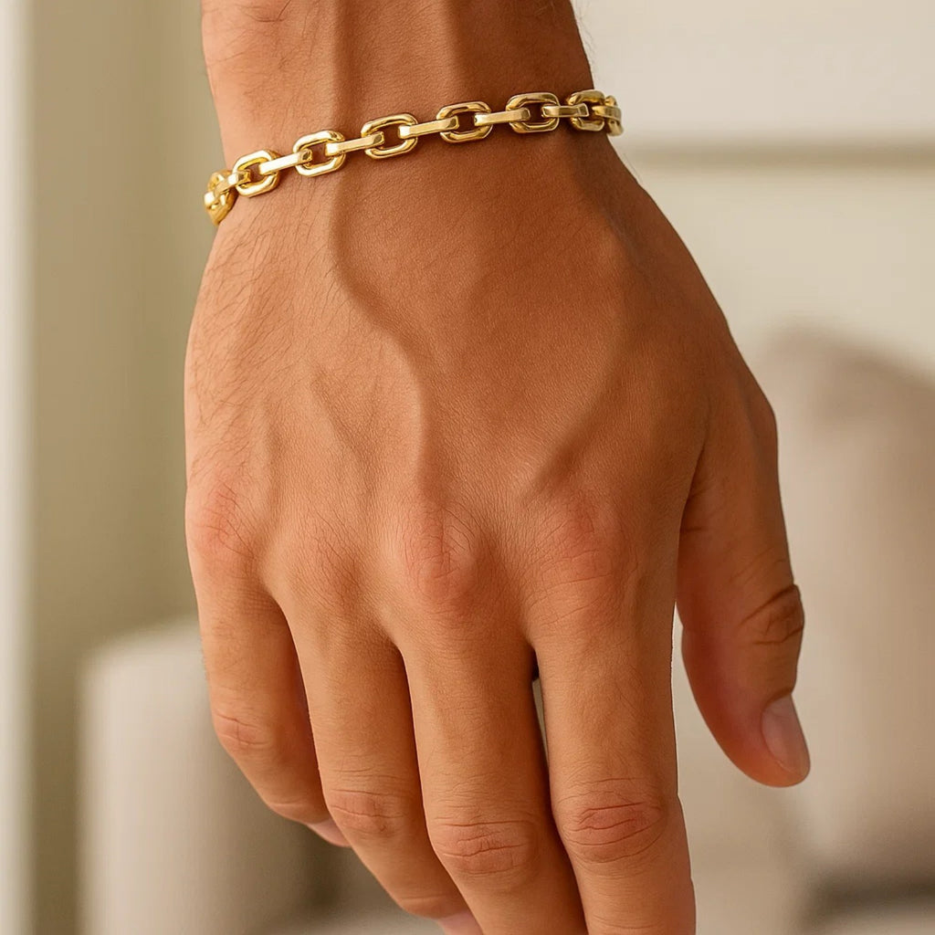 Elegant 14k yellow gold French cable chain bracelet featuring refined links, perfect for luxurious everyday wear.
