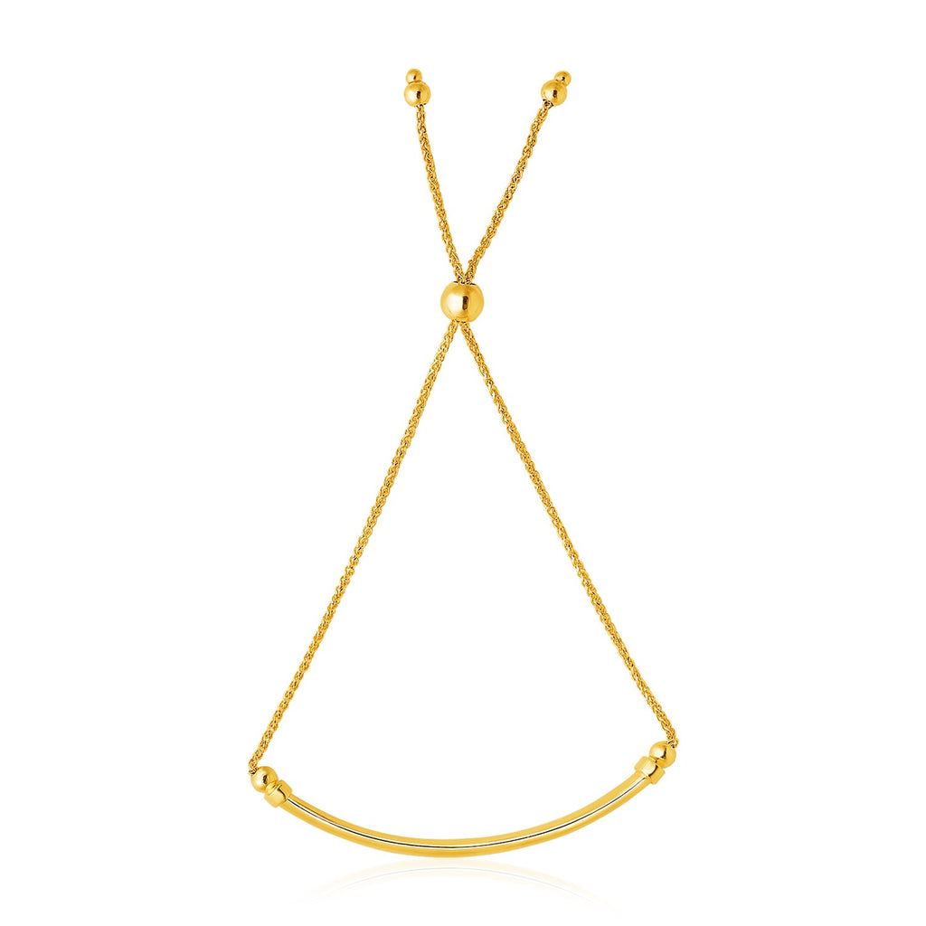 14k yellow gold smooth curved bar bracelet with lariat design and sparkling diamond accents for modern elegance.
