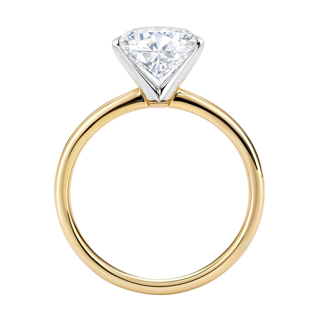 2 carat oval lab-grown diamond solitaire ring in 14k yellow gold, showcasing elegant design and timeless luxury.