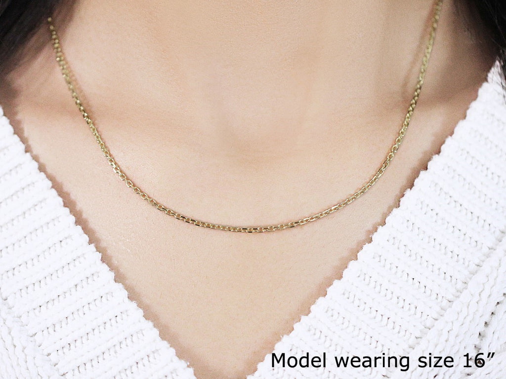18k yellow gold diamond cut cable link chain, contemporary design, featuring elegant round links, perfect for layering.
