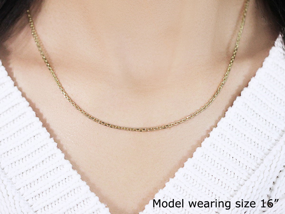 18k yellow gold diamond cut cable link chain, contemporary design, featuring elegant round links, perfect for layering.