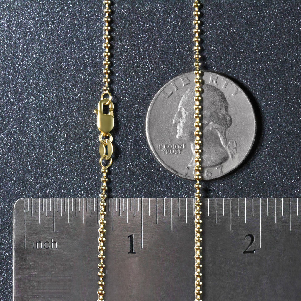 14k yellow gold bead chain, 1.5mm minimalist design, adorned with sparkling diamonds for a luxurious touch.