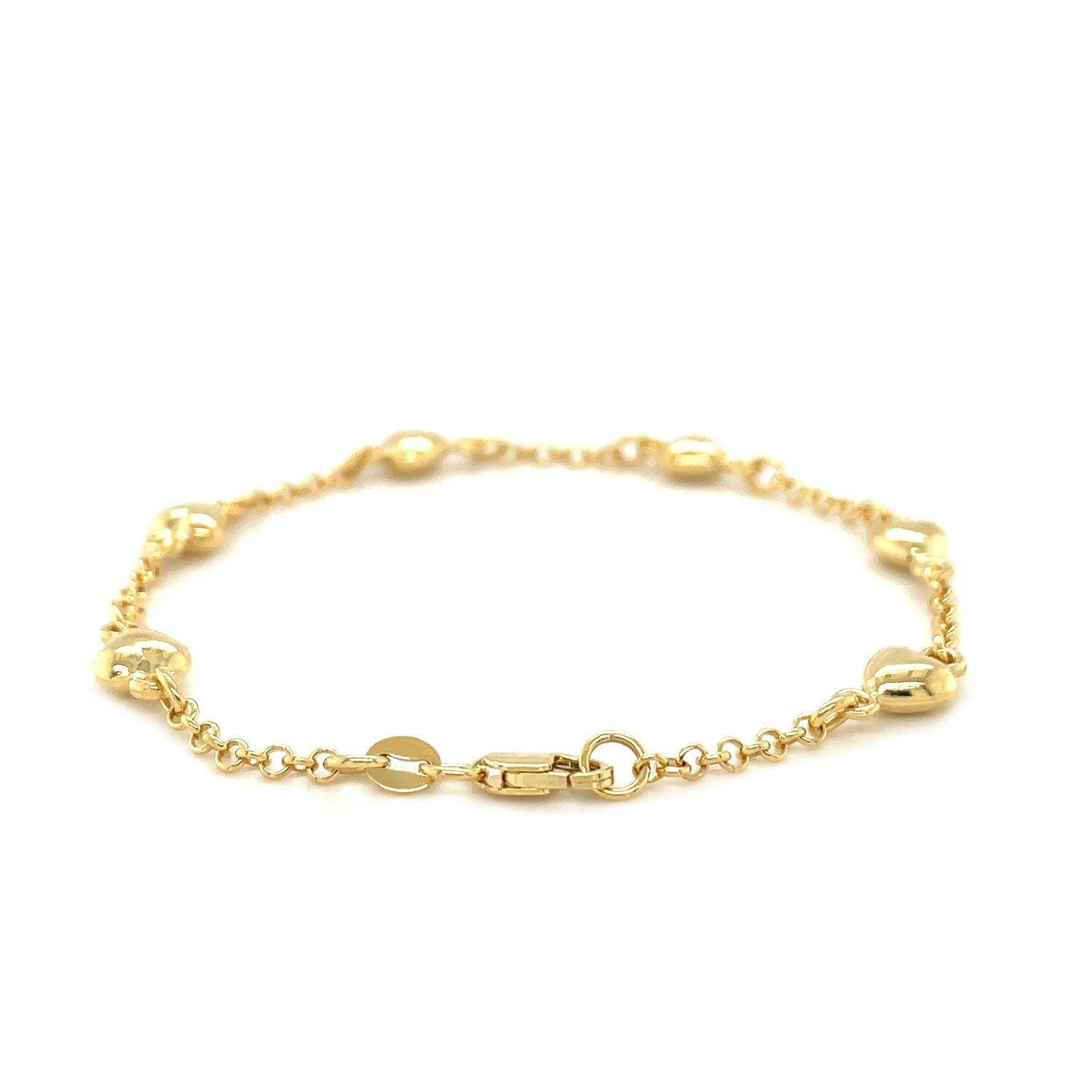 14k yellow gold rolo chain bracelet featuring elegant puffed heart stations for a classic, timeless look.