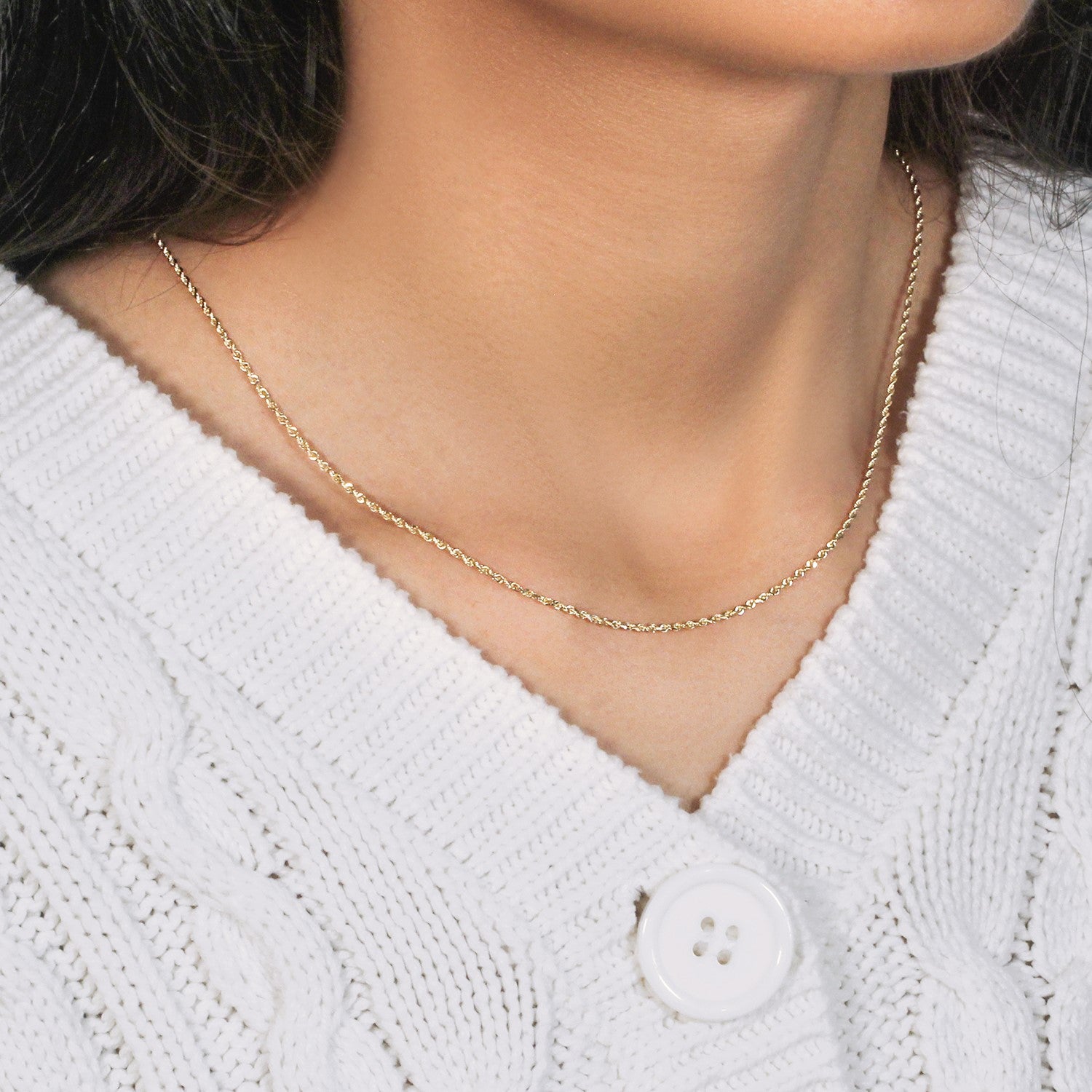 Elegant 10k yellow gold solid diamond cut rope chain, 1.40 mm, showcasing exquisite craftsmanship and luxurious shine.
