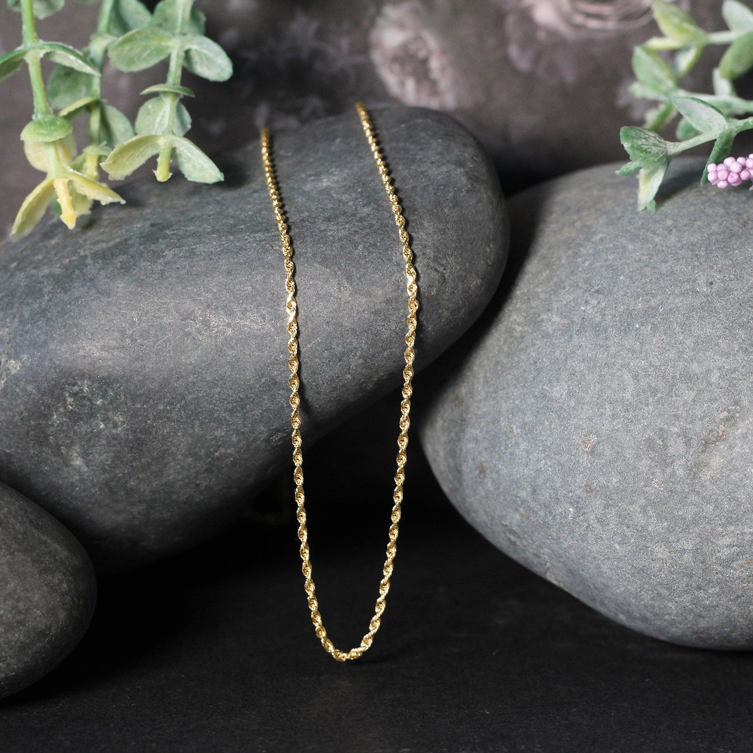 Elegant 10k yellow gold solid diamond cut rope chain, 1.40 mm, showcasing exquisite craftsmanship and luxurious shine.