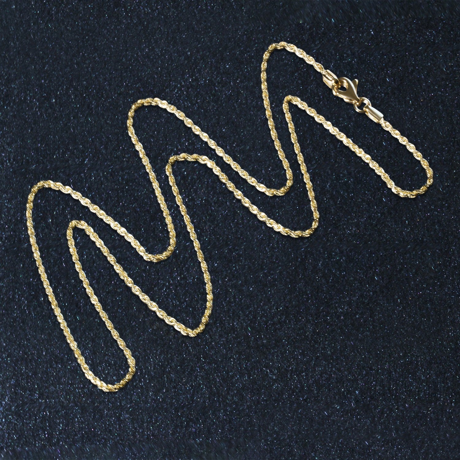 Elegant 10k yellow gold solid diamond cut rope chain, 1.40 mm, showcasing exquisite craftsmanship and timeless style.