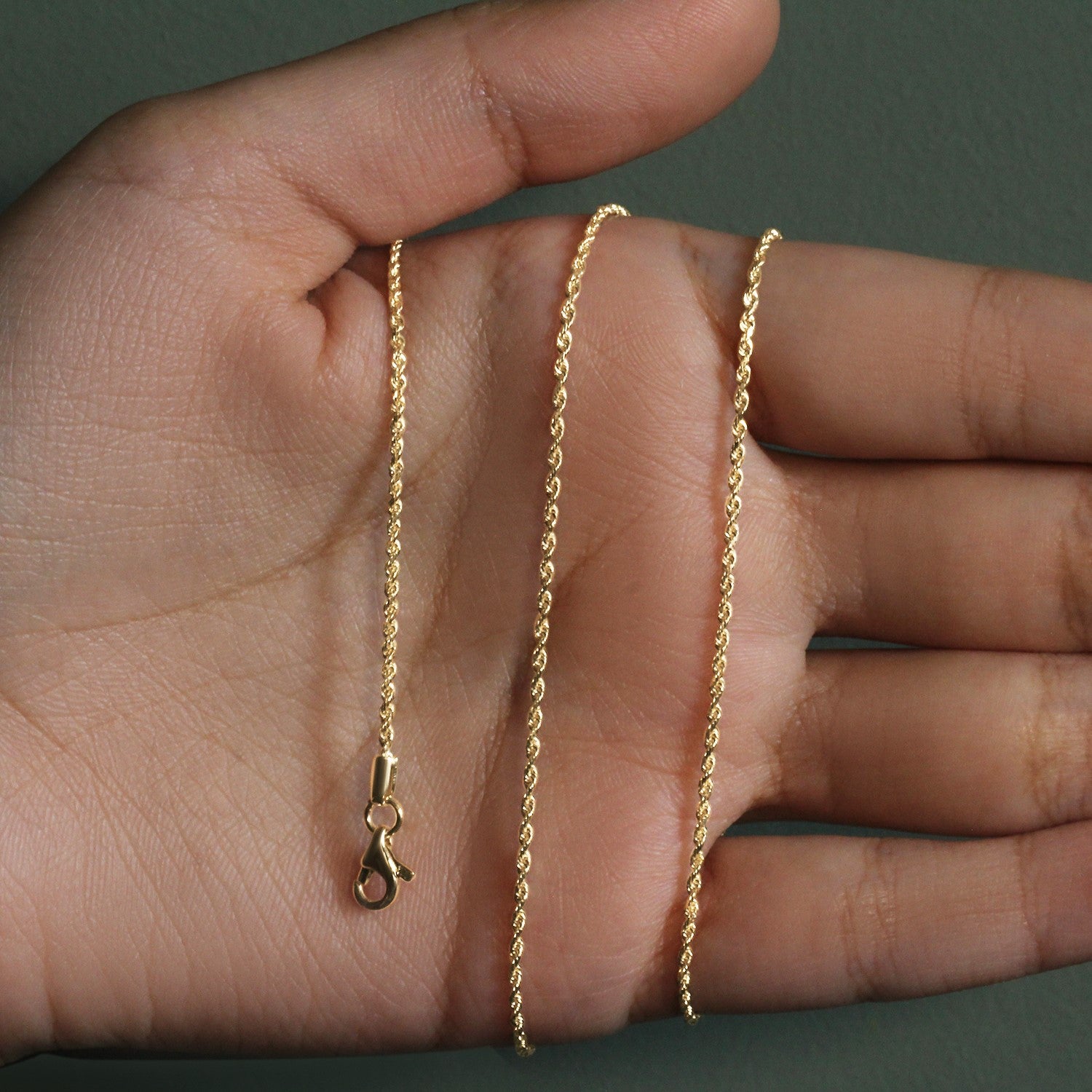 Elegant 10k yellow gold solid diamond cut rope chain, featuring a refined round design and exquisite craftsmanship.