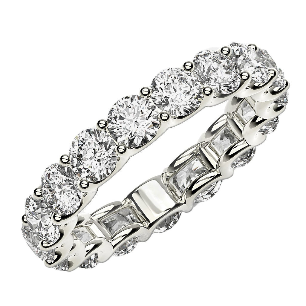 Round cut lab-grown diamond eternity ring in 14k white gold, featuring a stunning halo design for timeless elegance.