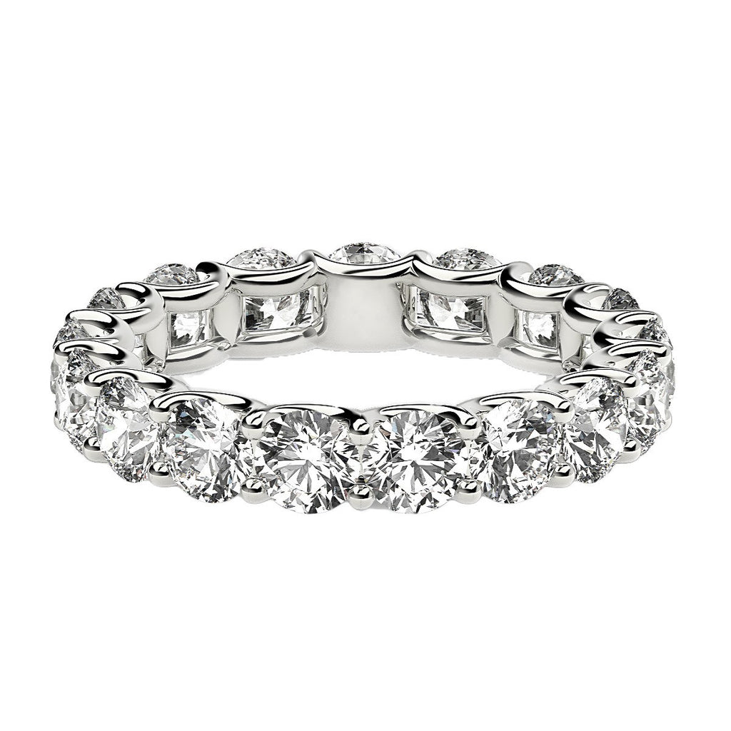 Round cut lab-grown diamond eternity ring in 14k white gold, featuring a stunning halo design for timeless elegance.