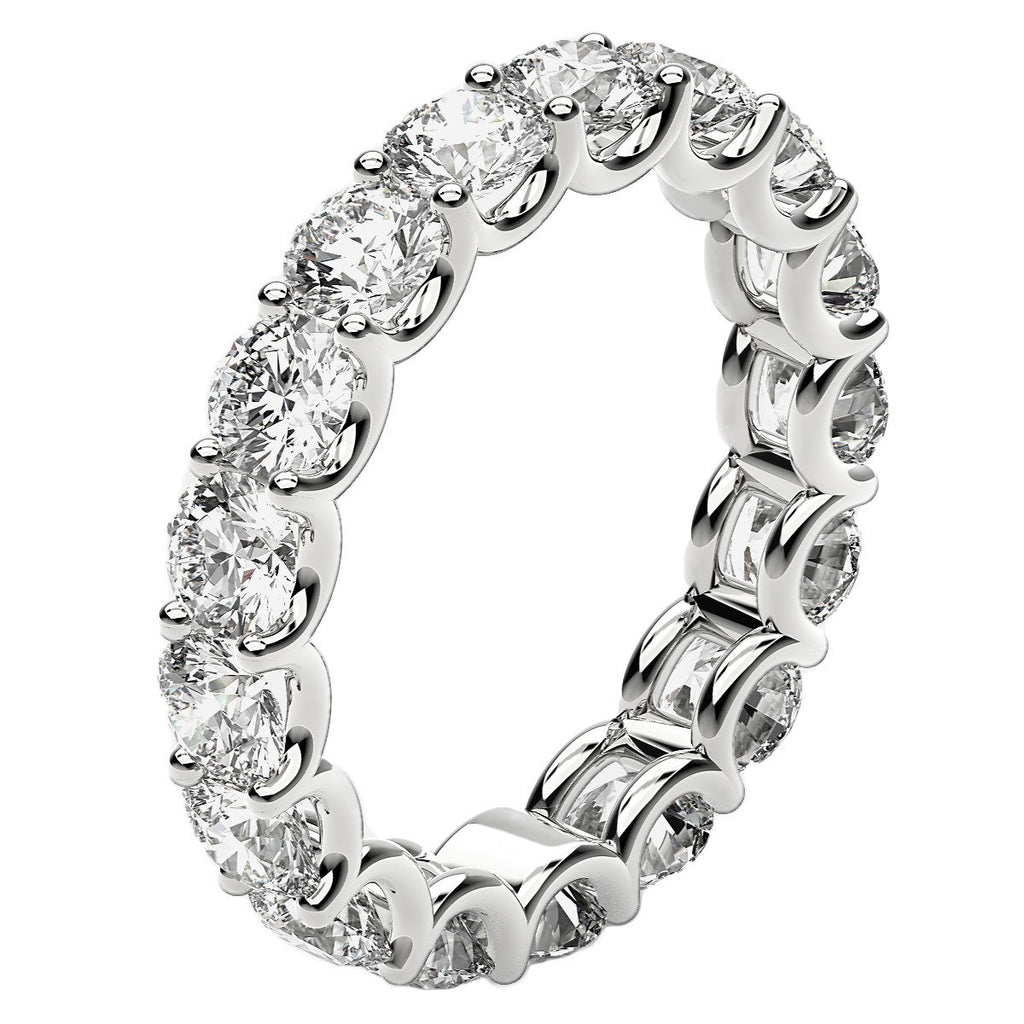 Round cut lab-grown diamond eternity ring in 14k white gold, featuring a stunning halo design for timeless elegance.