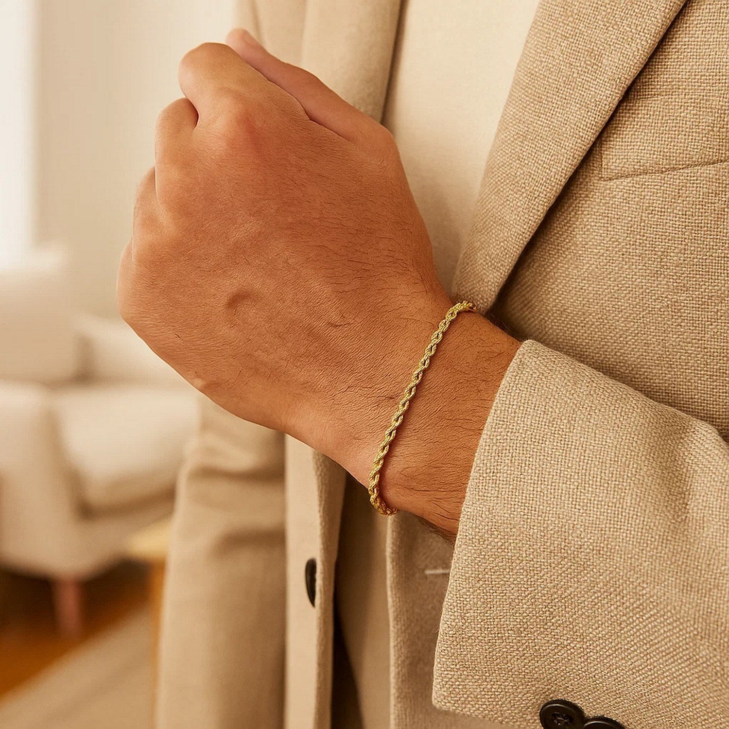 Silk rope chain bracelet in 14k yellow gold, featuring a classic design with elegant, smooth links.