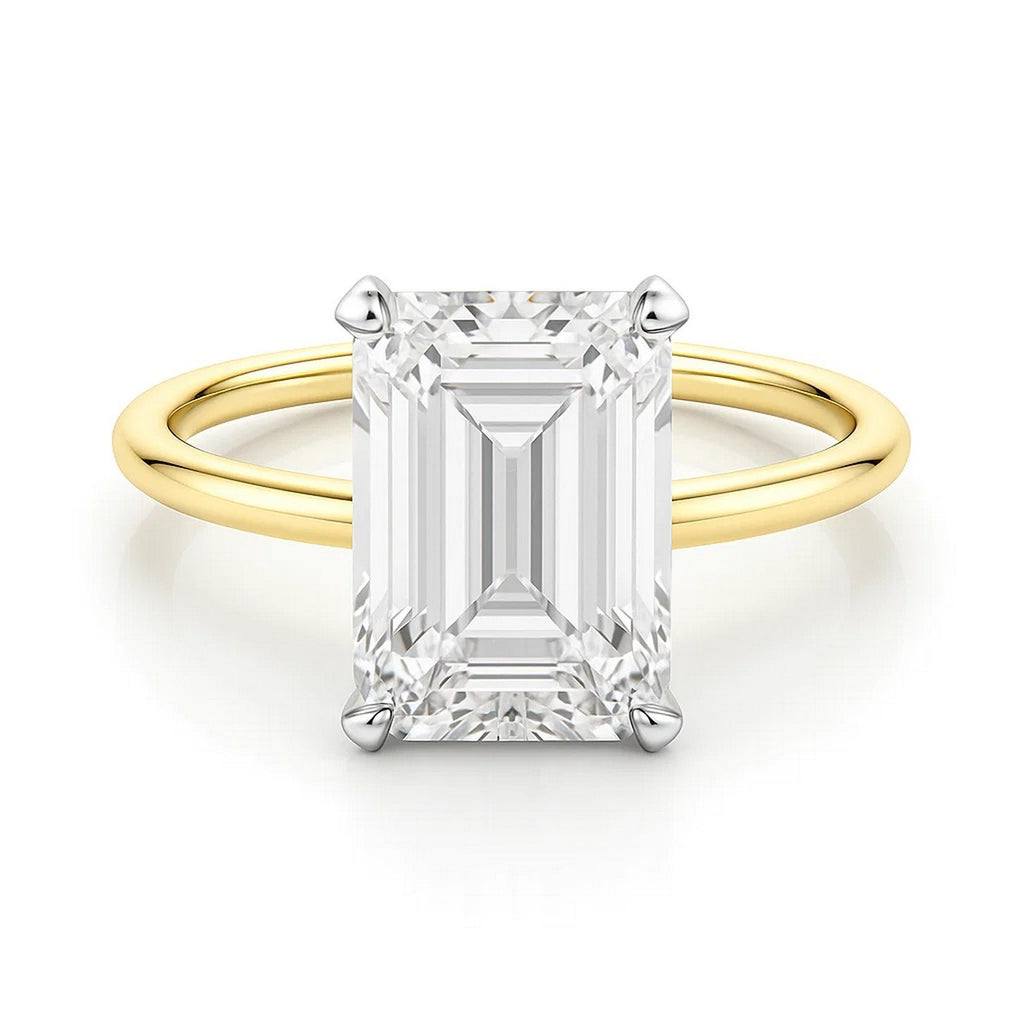 5 carat emerald lab-grown diamond solitaire ring in 14k yellow gold, showcasing modern elegance and exquisite craftsmanship.