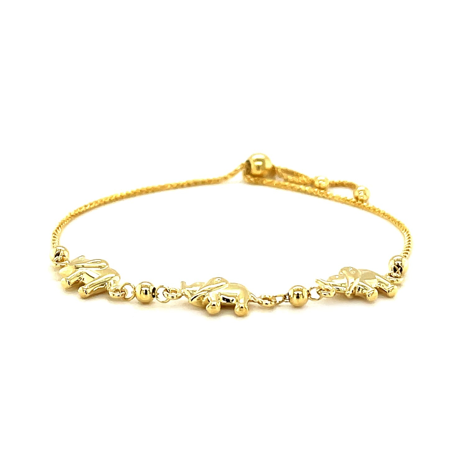 14k yellow gold lariat bracelet featuring elegant elephant stations on a delicate chain, perfect for sophisticated style.