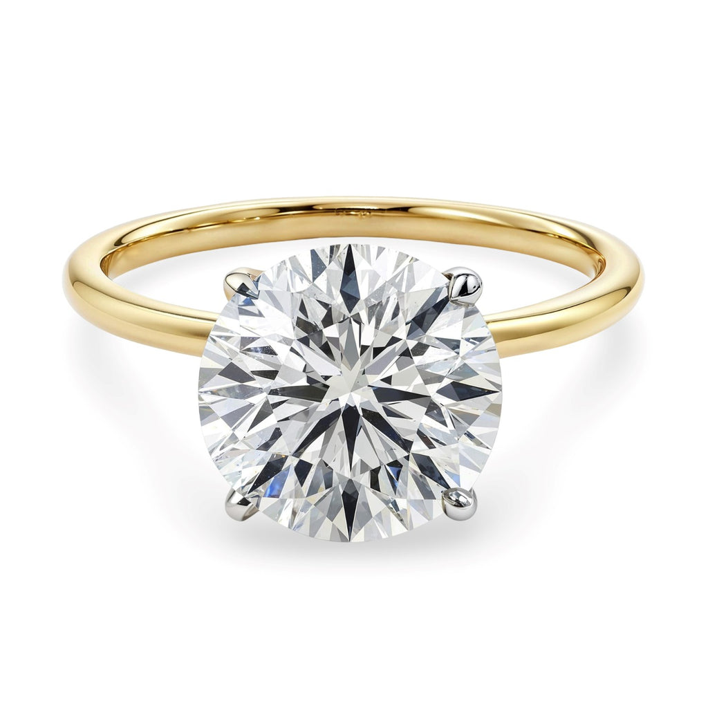 5 carat round lab-grown diamond solitaire ring in 14k yellow gold, showcasing modern elegance and timeless luxury.