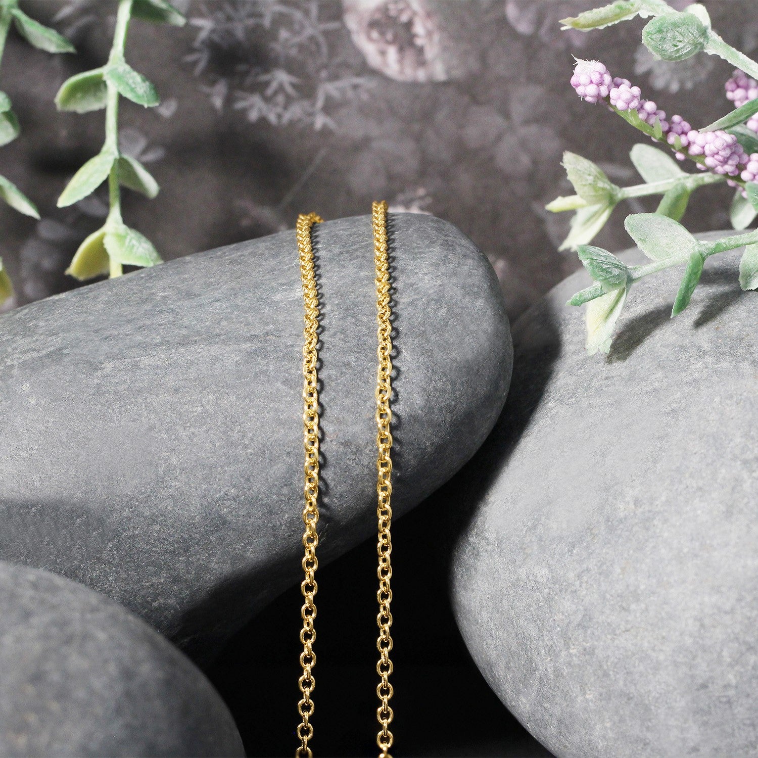 Elegant 14k yellow gold round cable link chain, 1.9 mm, showcasing timeless luxury and exquisite craftsmanship.