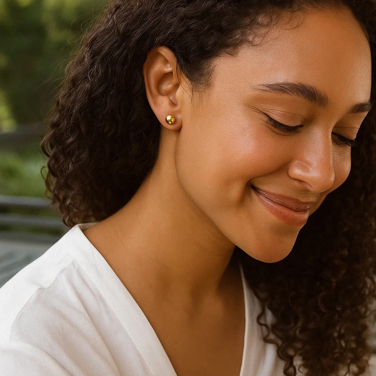 14k yellow gold polished round motif stud earrings with a sleek modern design, perfect for elegant everyday wear.
