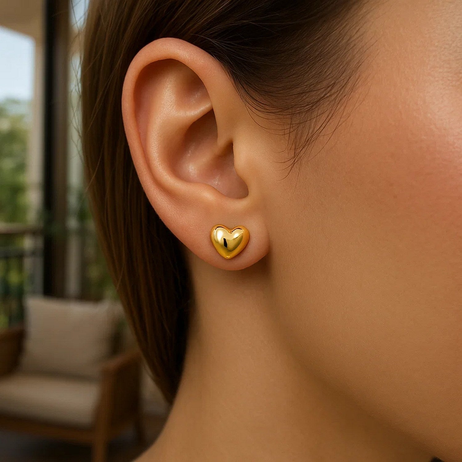 Elegant 14k yellow gold polished heart post earrings, showcasing a luxurious and timeless design.