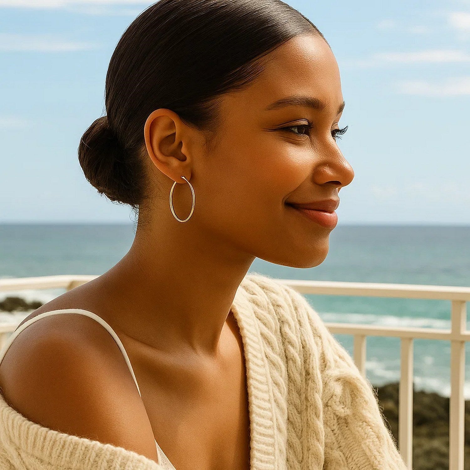 Elegant 14k yellow gold polished hoop earrings showcasing a timeless design, perfect for any luxury occasion.