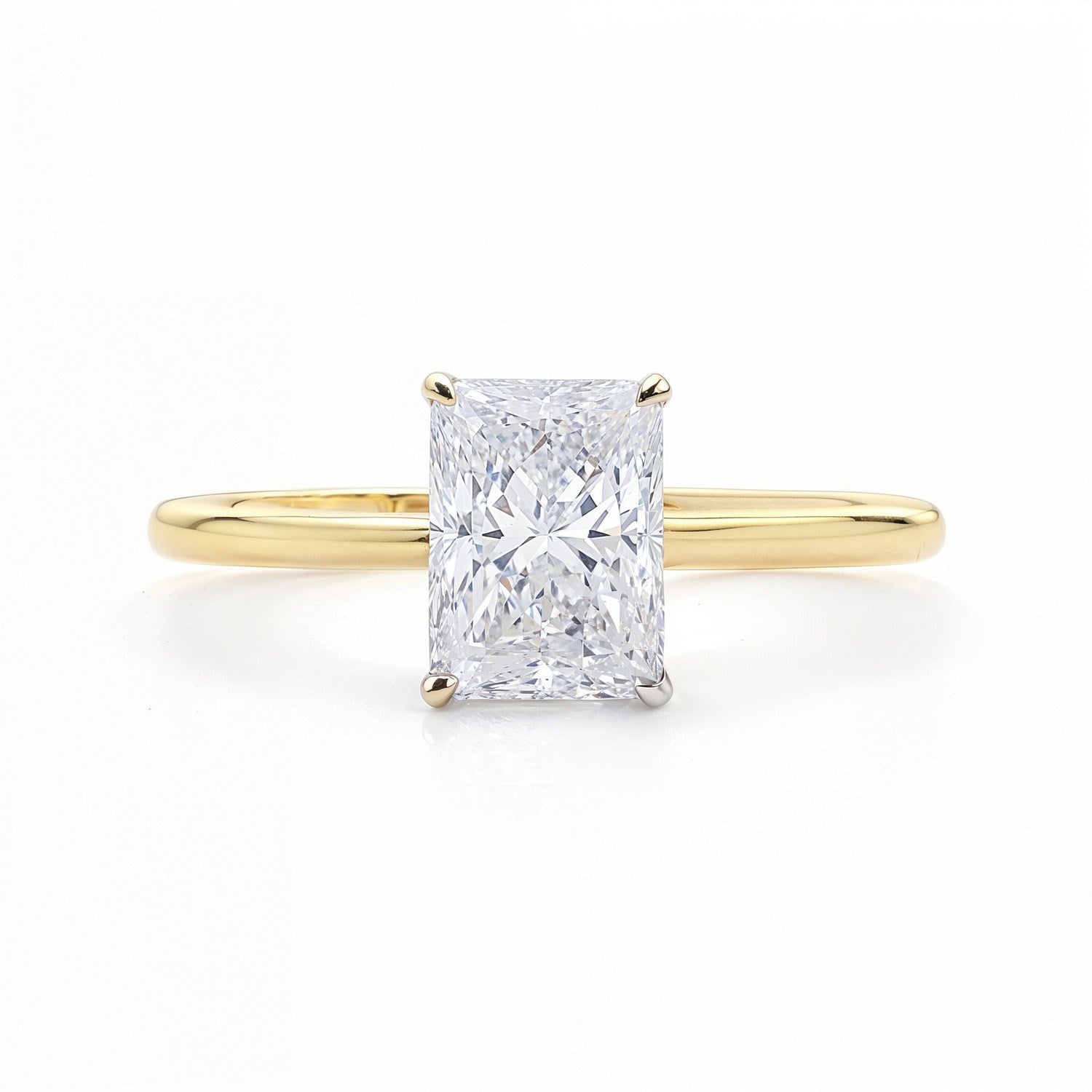 2 carat radiant lab-grown diamond solitaire ring in 14k yellow gold, showcasing timeless elegance and classic design.
