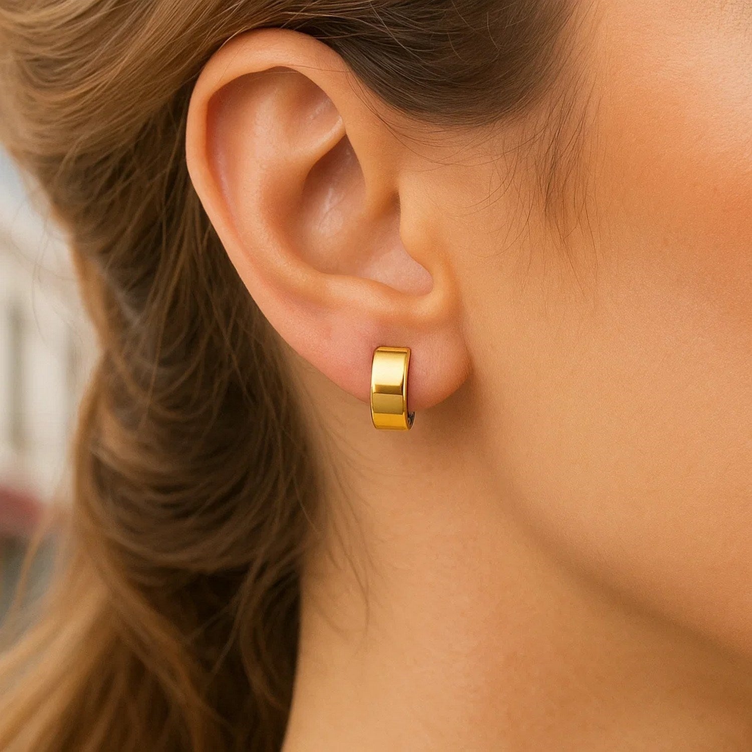 14k two-tone gold diamond textured hoop earrings showcasing elegant craftsmanship and luxurious design.
