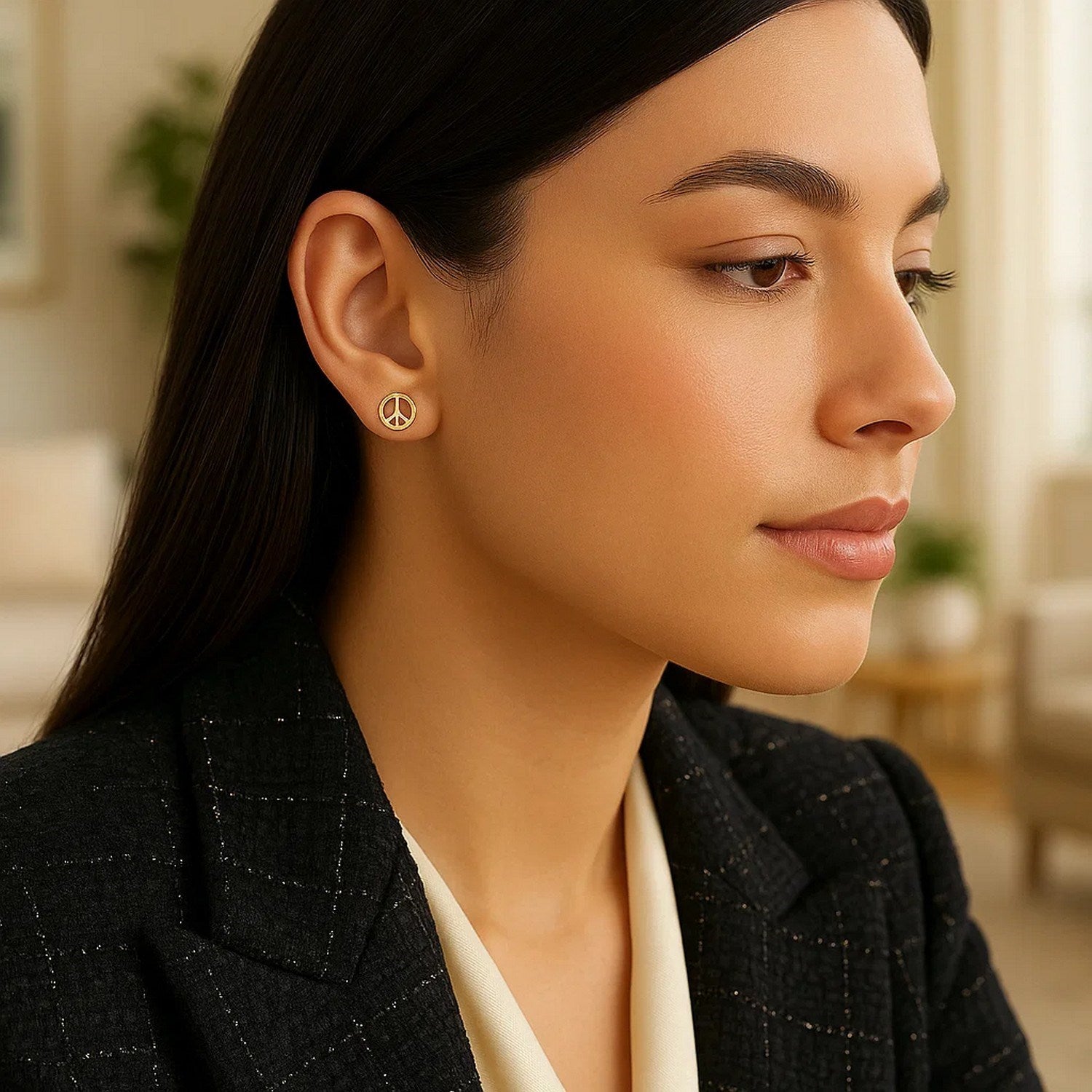 Elegant 14k yellow gold peace sign post earrings showcasing a luxurious and timeless design.