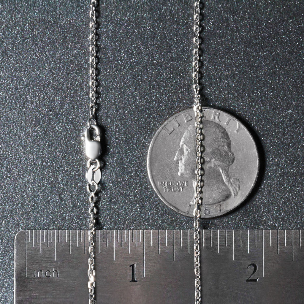 Elegant 18k white gold diamond cut cable link chain, featuring a refined design with round links, perfect for layering.