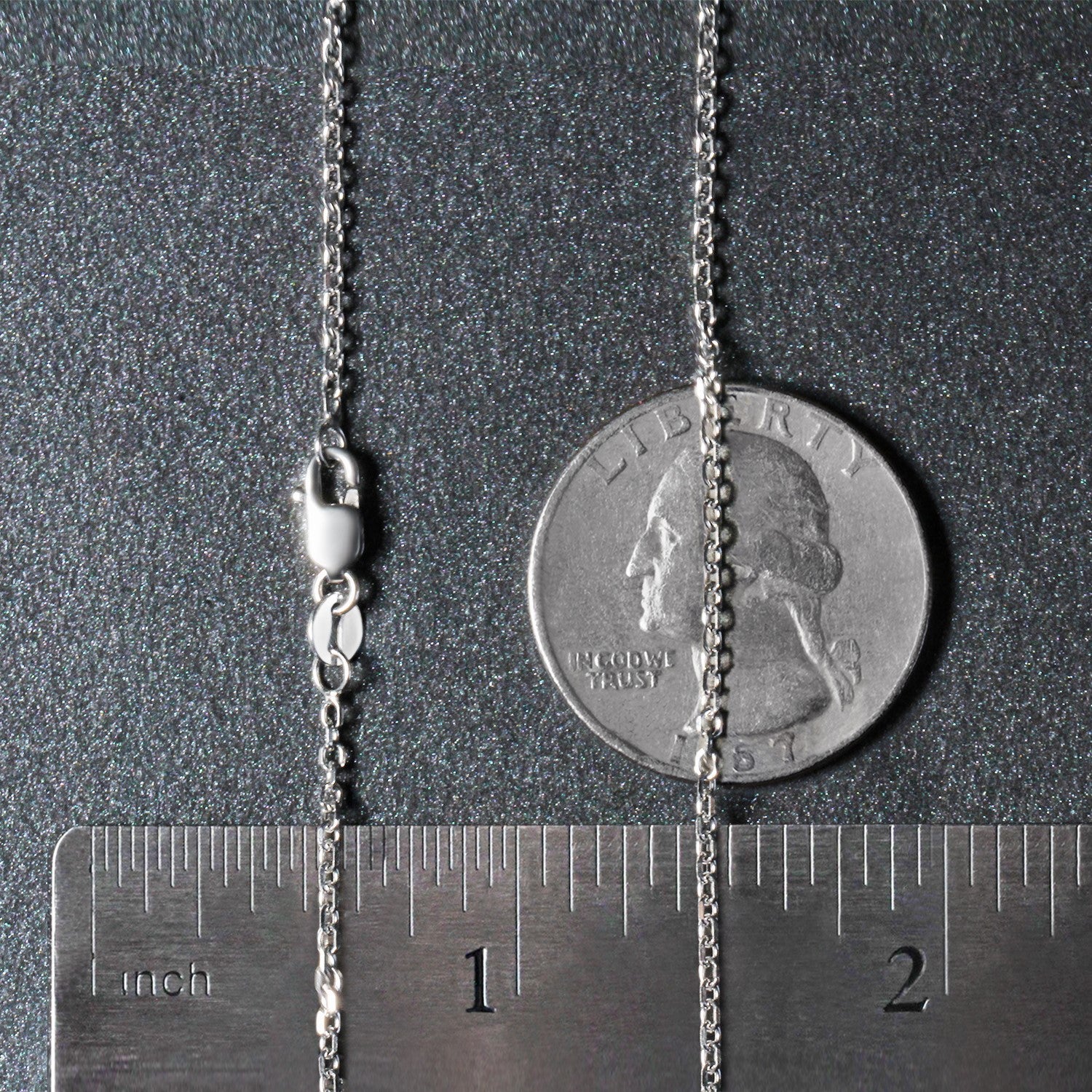 Elegant 18k white gold diamond cut cable link chain, featuring a refined design with round links, perfect for layering.
