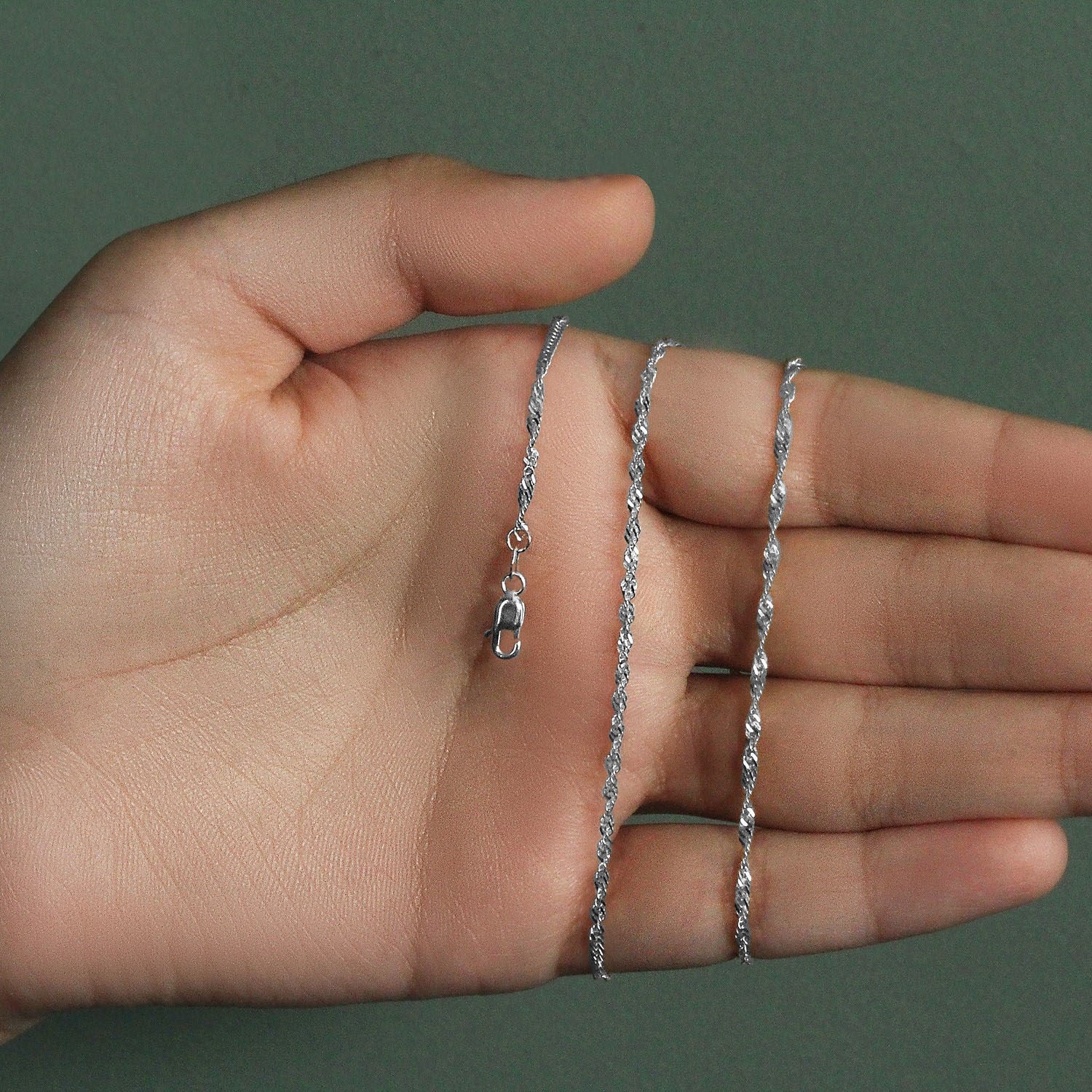 14k white gold Singapore chain with a sleek contemporary design, featuring a delicate 1.80 mm round link style.