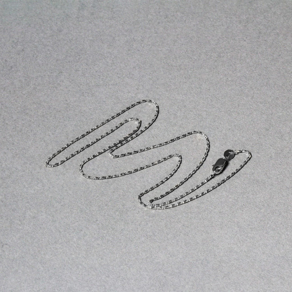 Elegant 14k white gold Lumina pendant chain showcasing a refined design and exquisite craftsmanship.