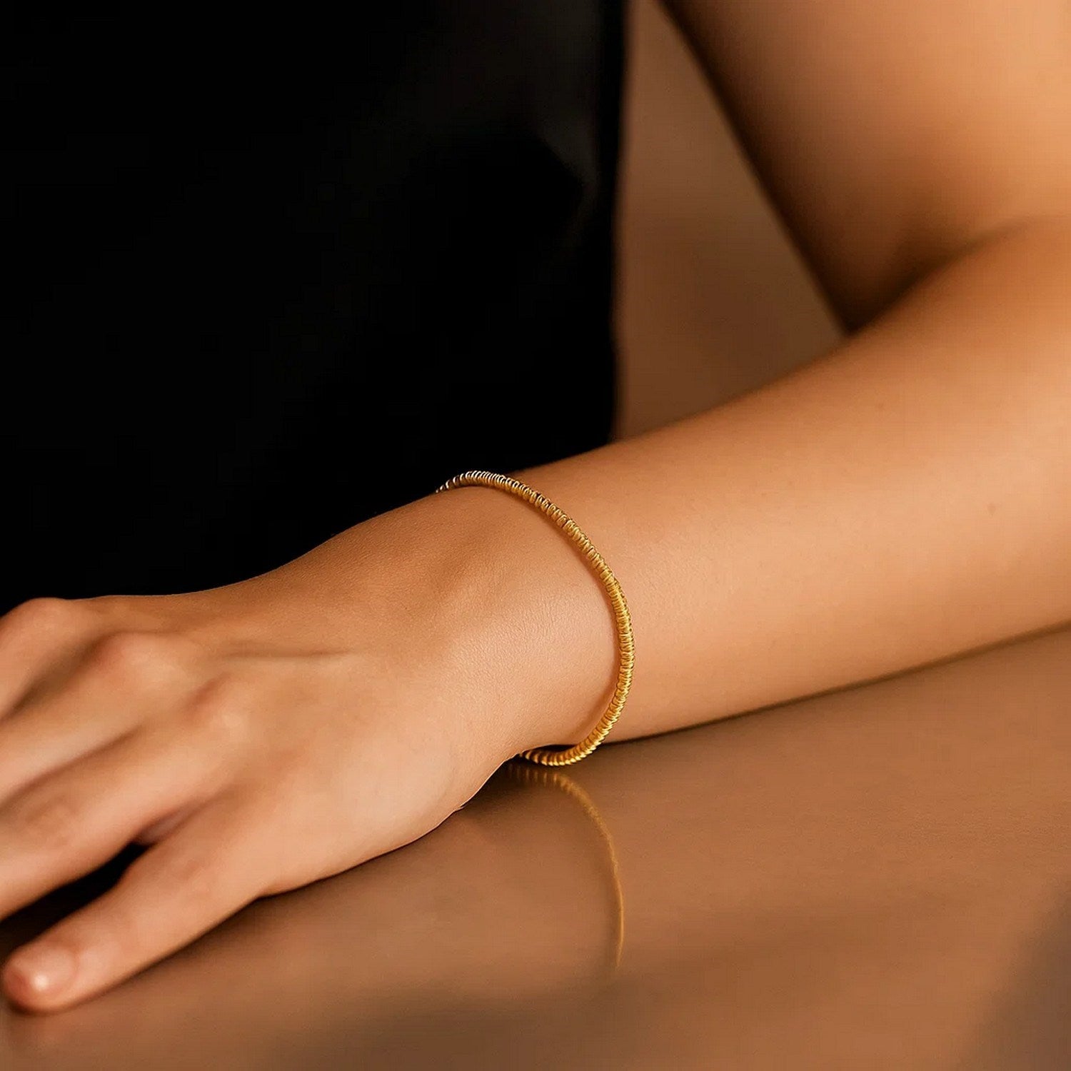 14k yellow gold modern chain bracelet featuring a delicate sparkle design, perfect for elegant layering or solo wear.