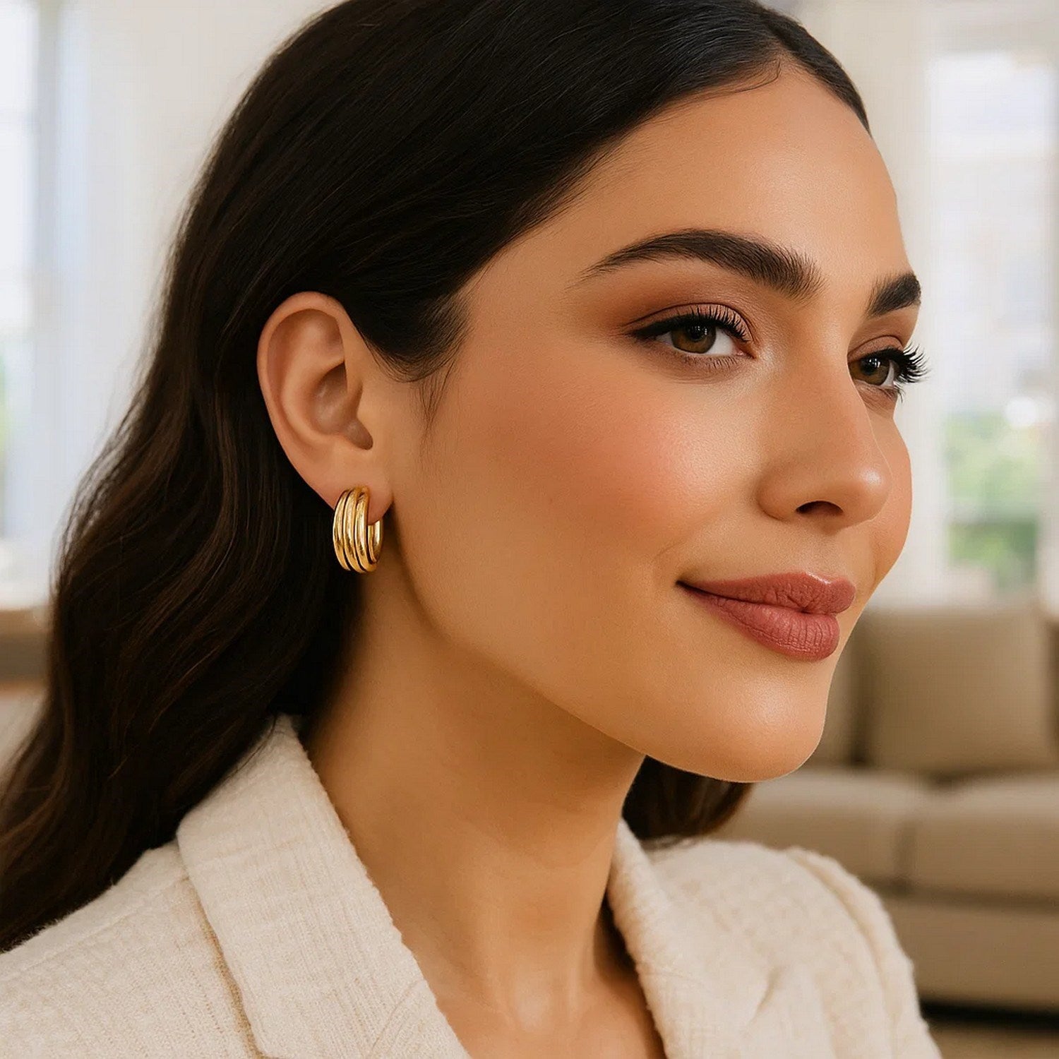 Elegant 14k yellow gold ribbed hoop earrings showcasing a refined design and luxurious finish for sophisticated style.