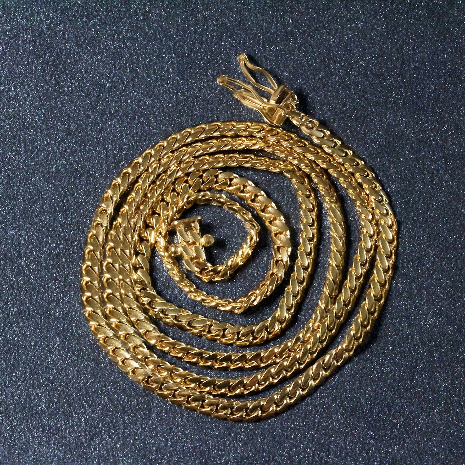Classic 10k yellow gold Miami Cuban chain, 3.20 mm, showcasing a timeless round design in luxurious 14k gold.