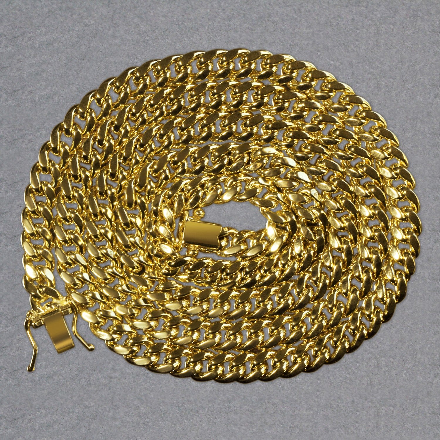 14k yellow gold semi-solid Miami Cuban chain, 5.00 mm, elegantly designed for a luxurious statement.