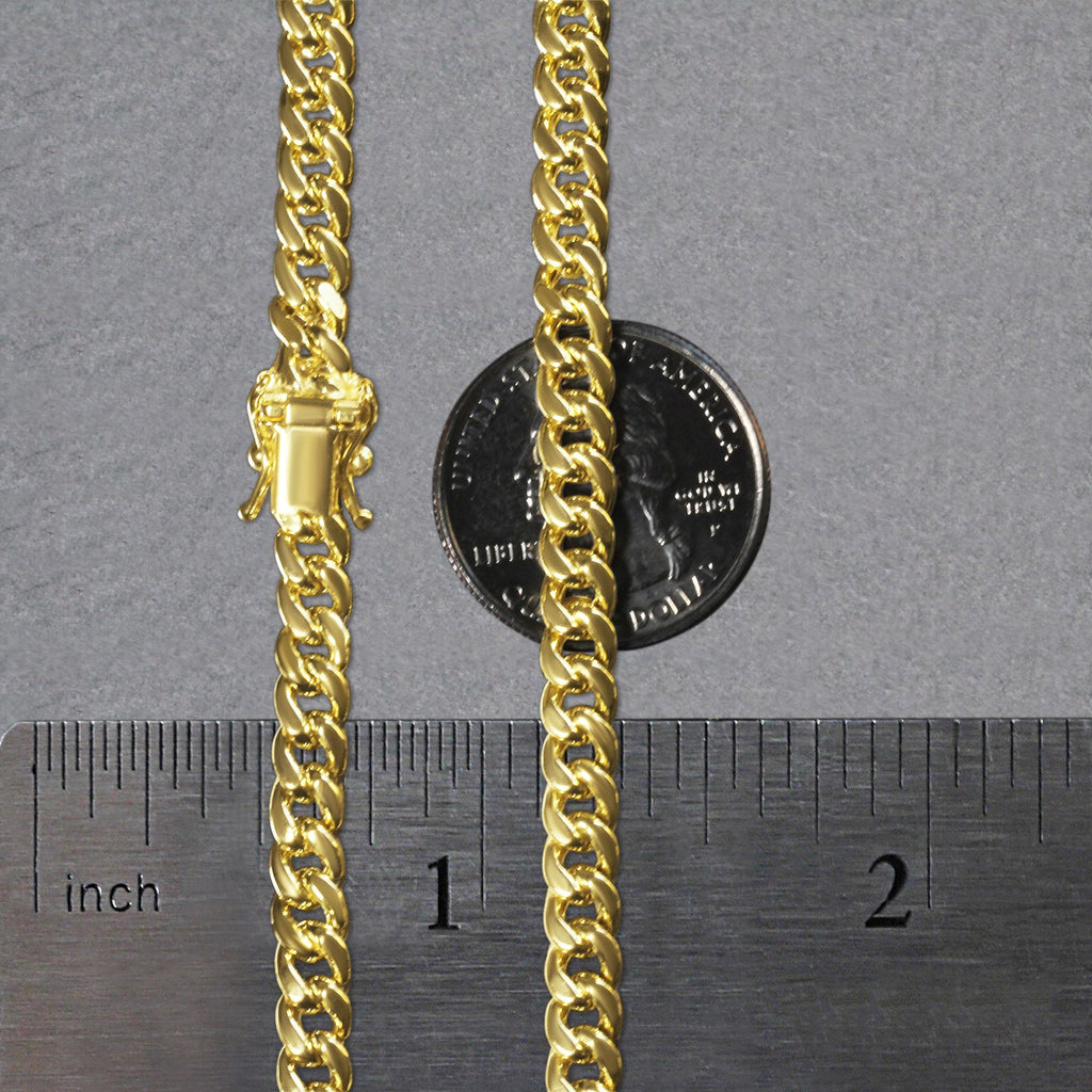 14k yellow gold semi-solid Miami Cuban chain, 5.00 mm, featuring an elegant round design for a luxurious statement.