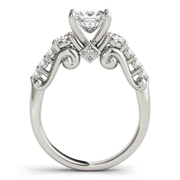 14k white gold antique design diamond engagement ring featuring three exquisite stones in a vintage setting.
