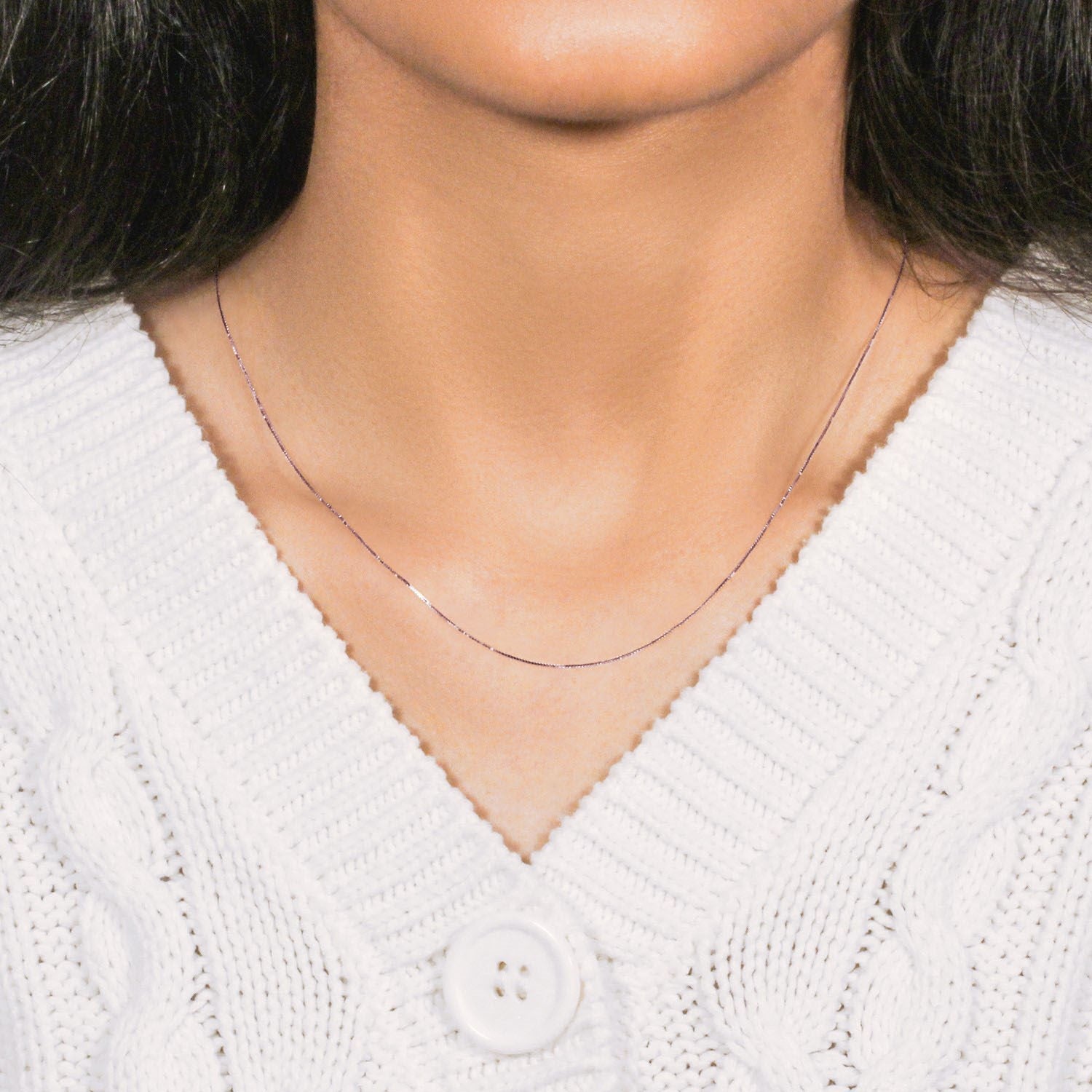 18k rose gold classic box chain, 0.60 mm, featuring elegant links for timeless luxury and versatile styling.