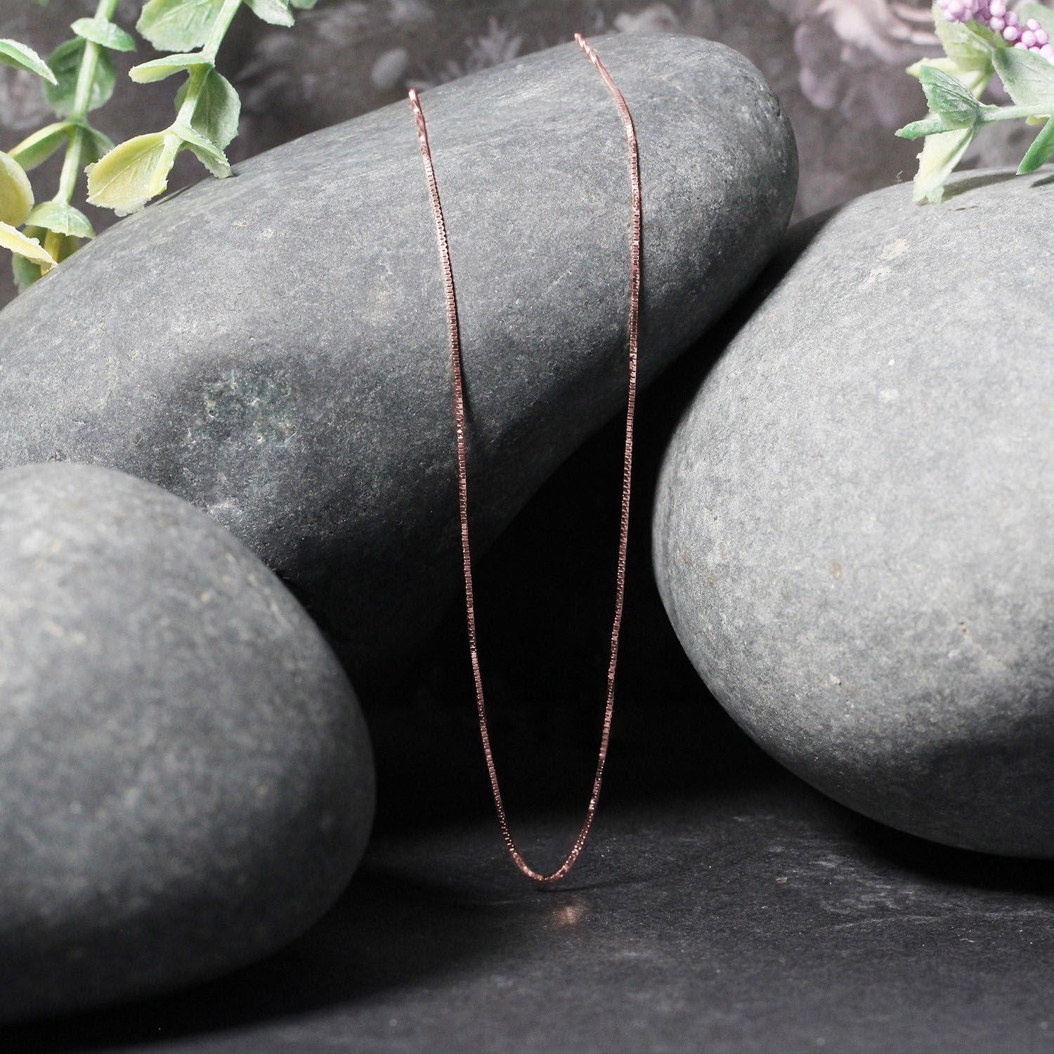 18k rose gold classic box chain featuring sleek links, perfect for layering or wearing solo as a timeless statement piece.