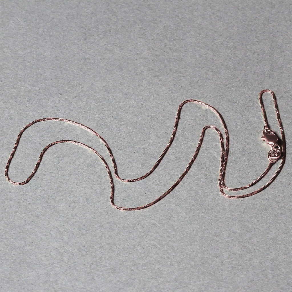 18k rose gold classic box chain with elegant links, perfect for layering or as a standalone statement piece.