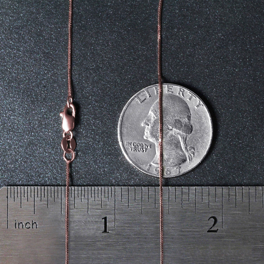 18k rose gold classic box chain featuring sleek links, perfect for layering or as a standalone statement piece.