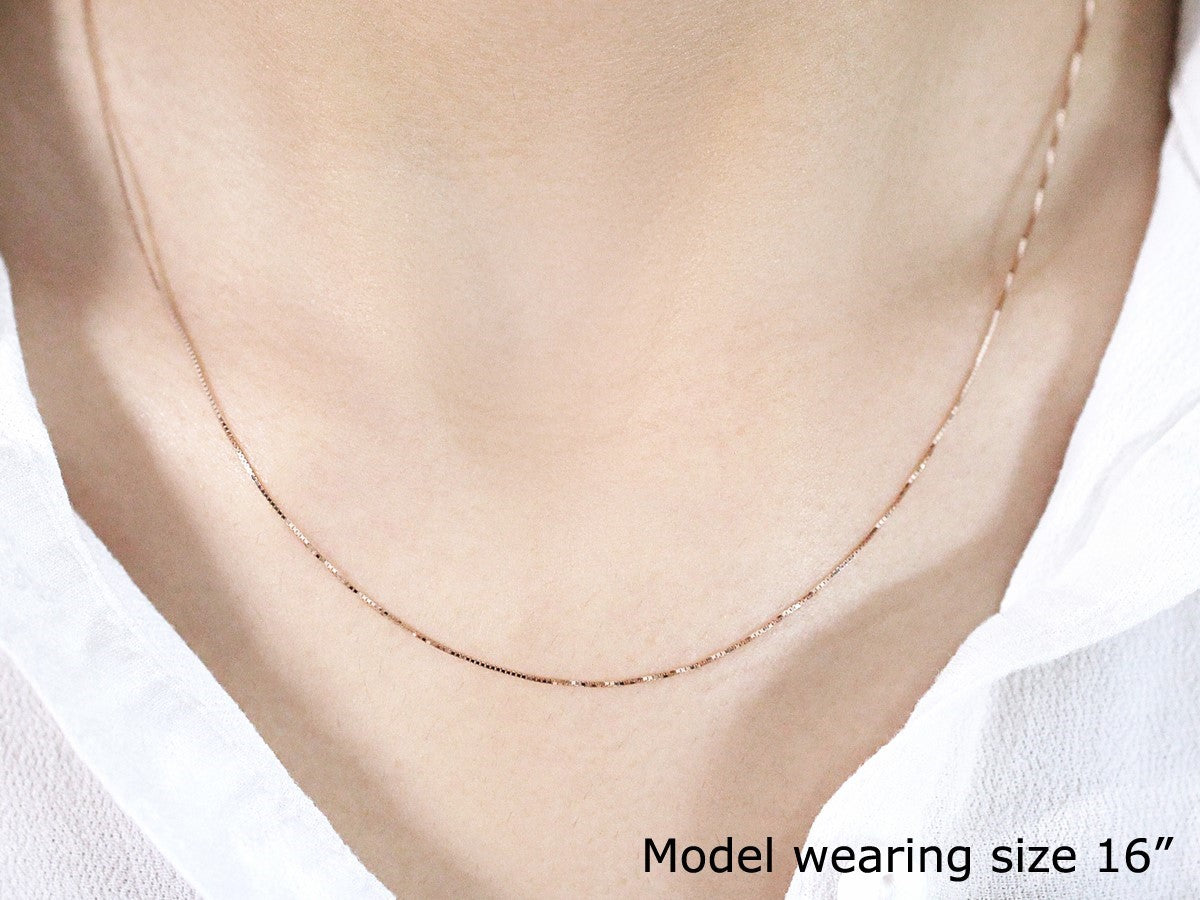 18k rose gold classic box chain featuring sleek links, perfect for layering or wearing solo with elegance.
