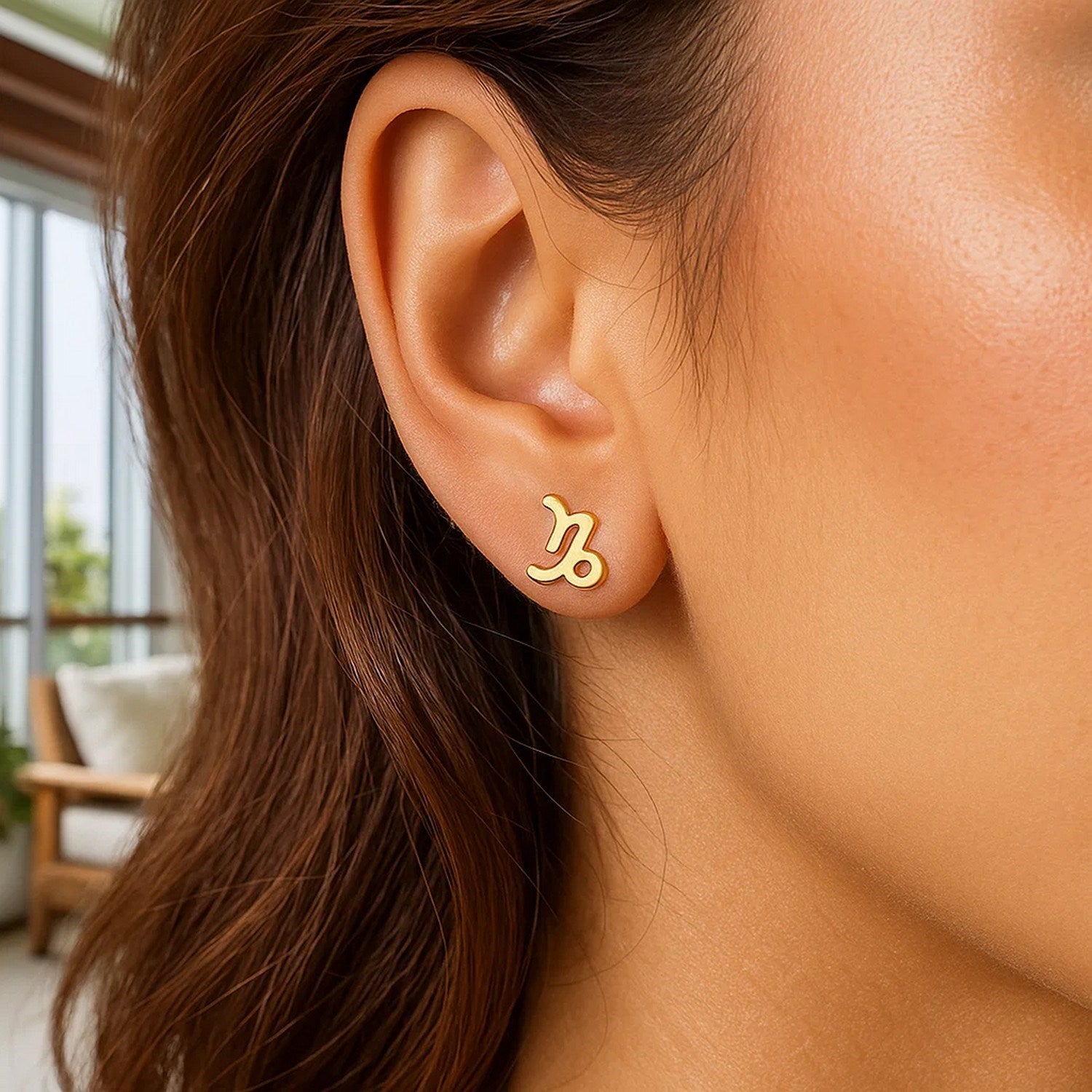 14k yellow gold polished stud earrings with a modern design, perfect for elegant everyday wear.